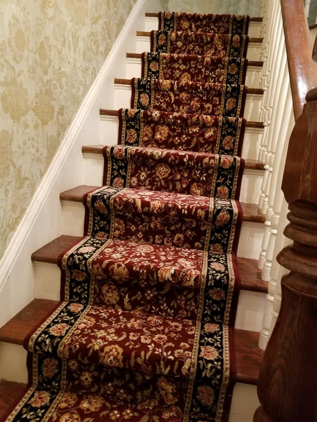 Detailed patterned stair runner installation